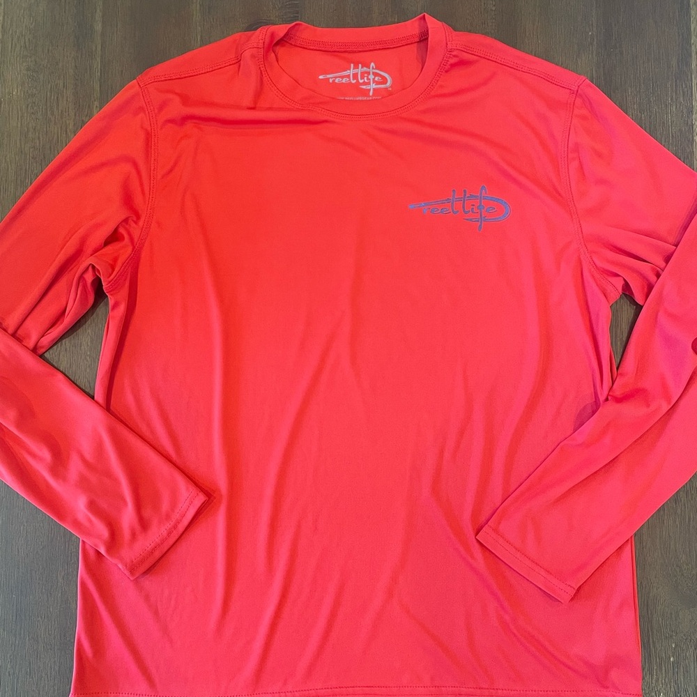 Reel life sun defender iv long sleeve fishing tee.  American flag